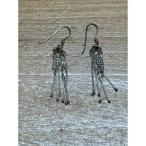Vintage women's dangle fashion earrings. silver tone. drop/dangle. jewelry